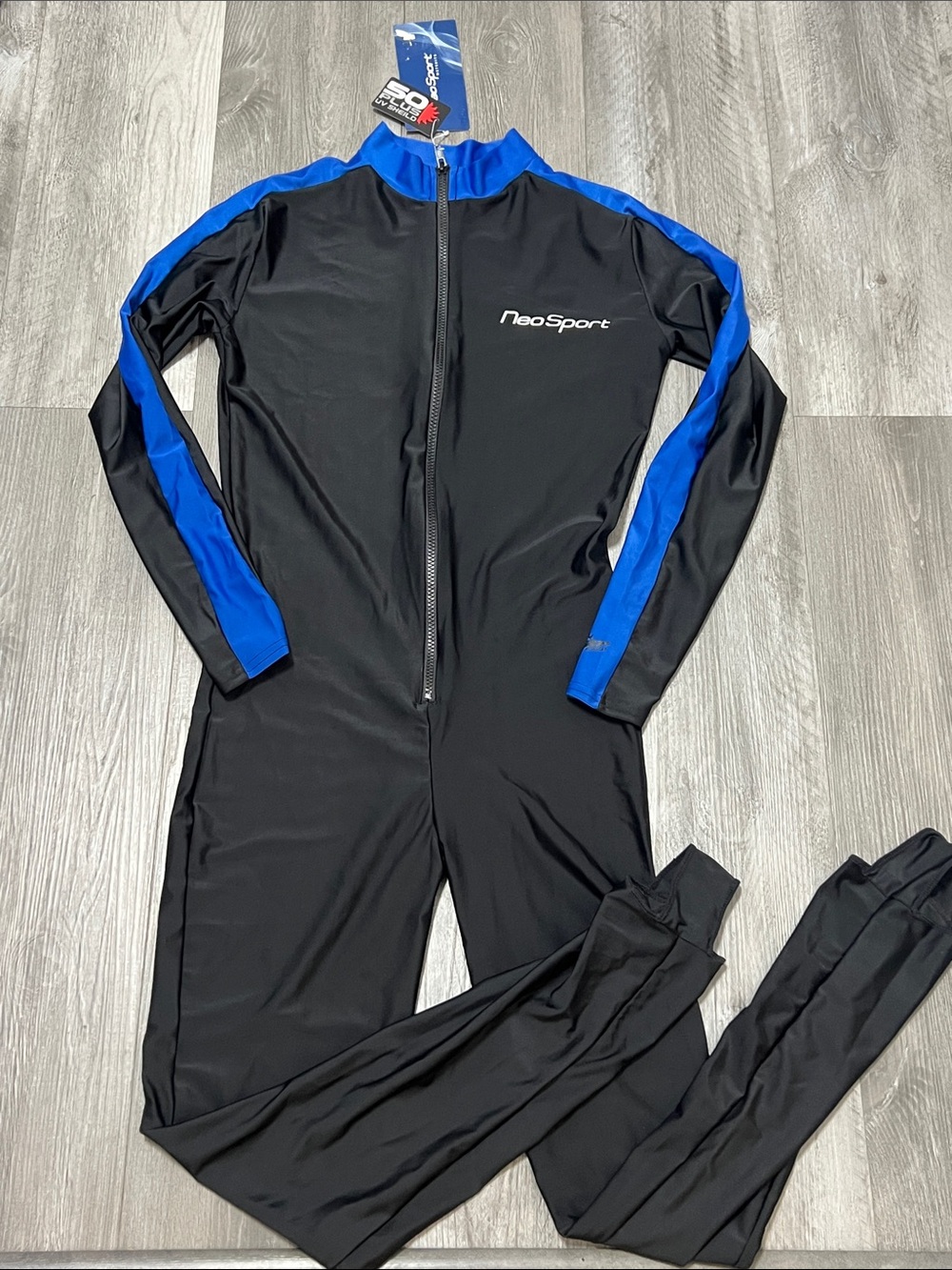 NeoSport unisex full-body sports wetsuit skin in blue and black. NWT/ size XL
